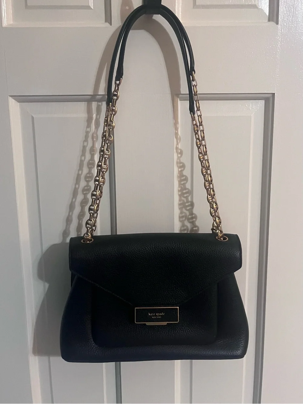 kate spade Black Pebbled Leather Envelope purse with Gold Plaque Accent
